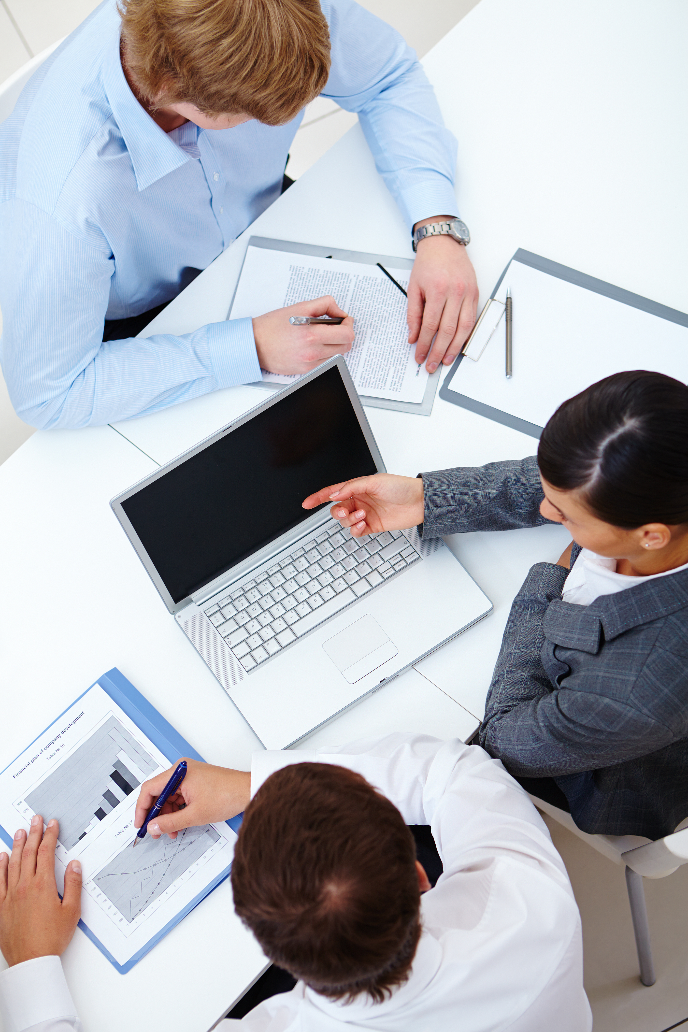 executives-working-together-laptop.jpg